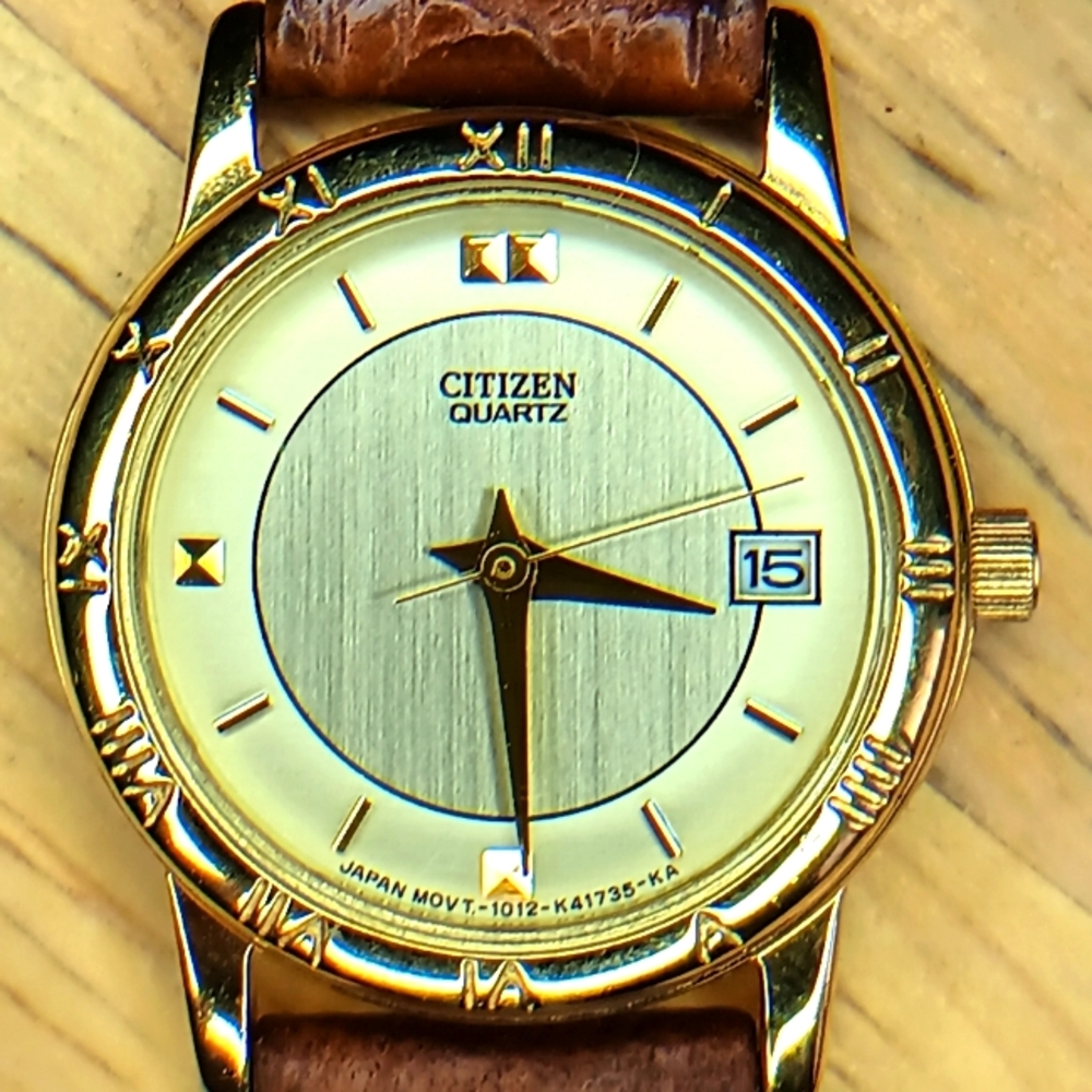 X Citizen 3 hand movement, with date, gold case 24mm Roman numerals around bezel